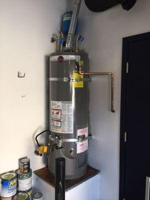 Rheem 38gal residential water heater with new flex lines and expansion tank. Looks sharp and clean.