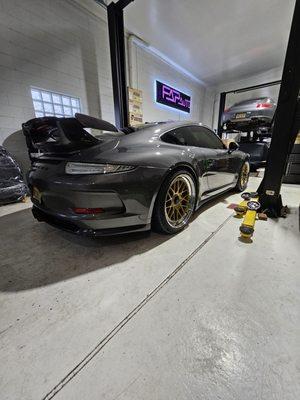 Porsche we powder coated wheels on and another we are doing brakes on.