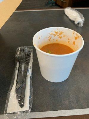 Takeout tomato soup that cost $9 for a tiny cup that was only half filled