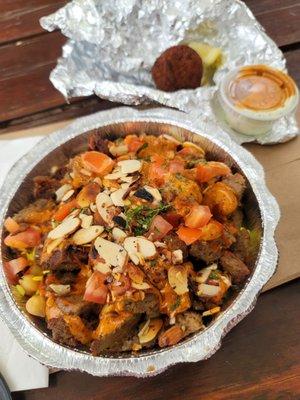 Beef and Lamb Kebab Bowl with Sriracha and Spicy Red Sauces and a side of Falafel!