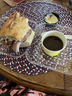 Freshly made Roast Beef Sandwich with Au Jus. The owner made the roast beef himself.