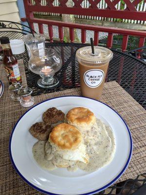 Biscuits and gravy with eggs and house sausage, accompanied by an iced coffee from down the road. What great fuel for the day.