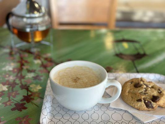 Caramel macchiato latte with a chocolate chip cookie. They also serve hot tea!