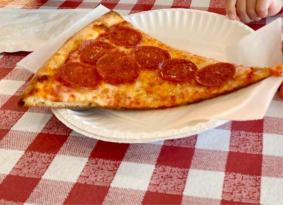 Slice of Pepperoni pizza