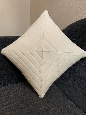 Declarative leather pillow