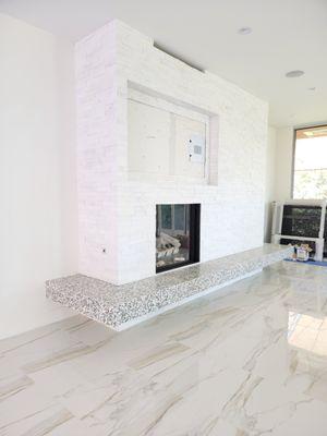 Staked Stone Fireplace & Porcelain Floor