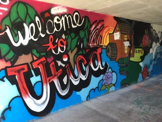 A colorful tunnel on the trail in downtown Utica