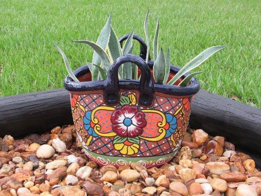 Love this pot/planter that 'I had to have'. It fits in well in our yard.