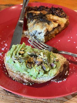 Mushroom spinach quiche with Avocado Mash on pretzel bread