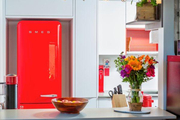 Red & White Galley Kitchen by Leicht