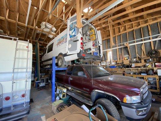 The mobile van undergoing some upgrades,  Lp generator, Lp tank and lines, battery storage and holders in undercarriage.