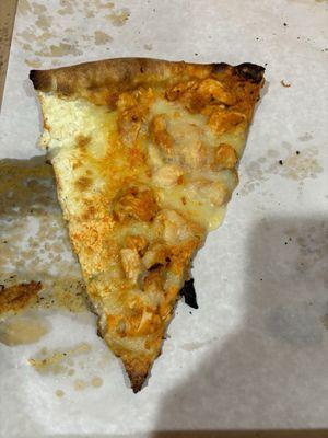 Sad excuse for a Buffalo chicken slice. Burnt bottom, Half white slice? And Overpriced.