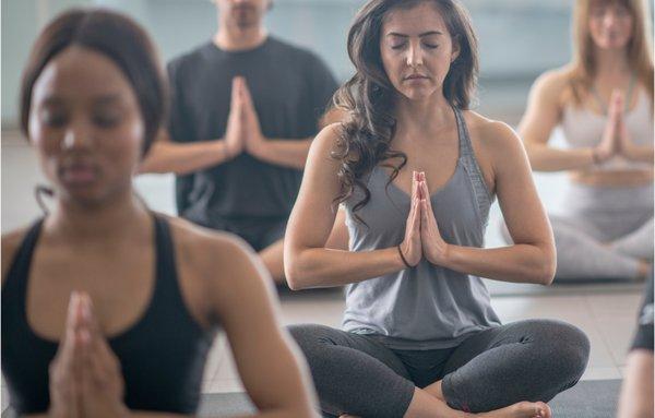 kundalini yoga and meditation students in Prayer Pose