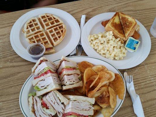 Belgian waffle, haddock melt with mac and cheese, turkey club with homemade chips