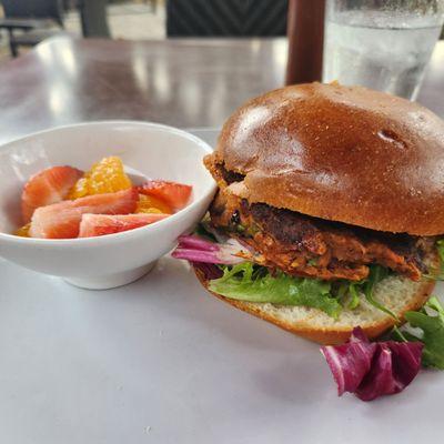 Veggie burger and fruit.