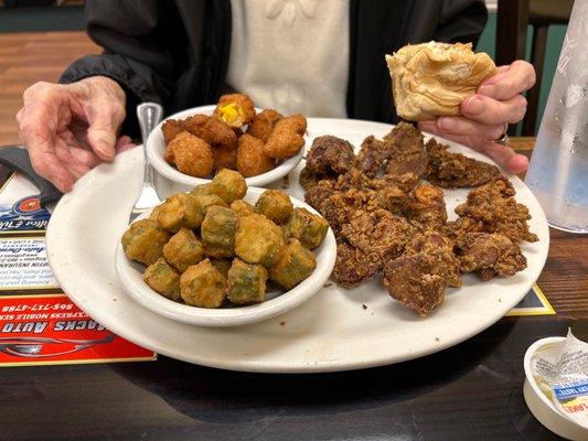 Chicken livers, fried okra, corn nuggets being enjoyed by my Mom.