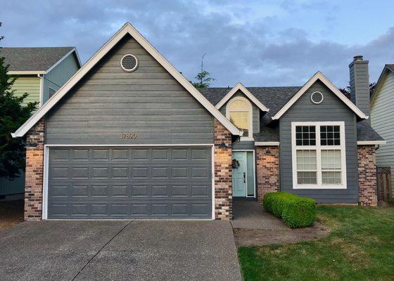 After a new roof and a fresh coat of paint our 25 year old house looks brand new!