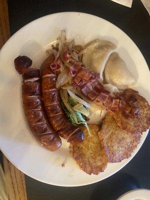 Kozak Platter. Order the perogies pan fried instead of steamed... worth every calorie.