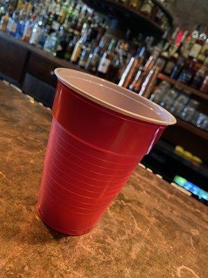 Water served on red SOLO cups