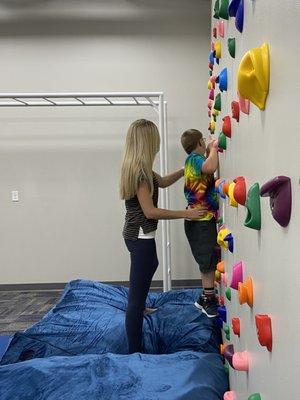 Working hard on our rock climbing wall!