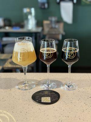 Half pours/flight. Weak Sauce triple ipa (left), Faded Storm Barleywine (middle), and Back to Basics Russian Imperial Stout (right)