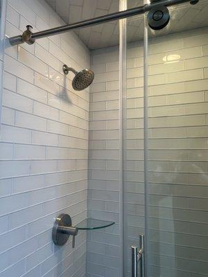 Glass tile stand-up shower.