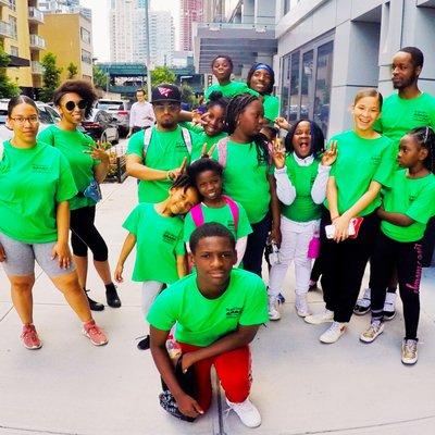 A group picture of some employees and students as they head out on a field trip.