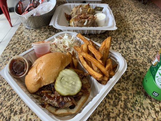 Pulled pork sandwich, fries, coleslaw, loaded baked potatoes.