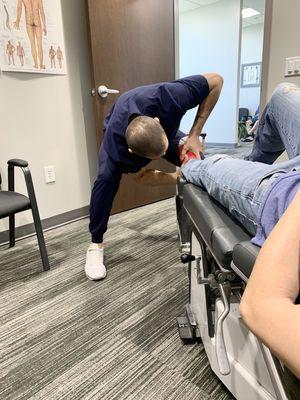 Dr. Nash adjusting an ankle after one of the most common sports injuries.