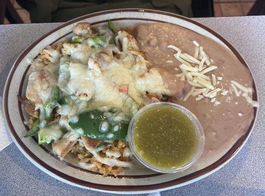 Julio's Plate! Beans, Rice, Green Bell Pepper, Chili Verde and cheese! Comes with homemade corn or flour tortillas