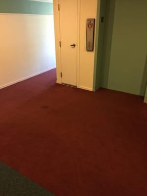 Elevator, stains on carpet