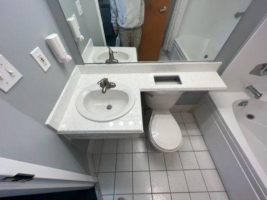 The after photo shows a whole new side of this bathroom. Looks good!