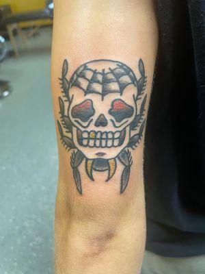 Skull bug tattoo