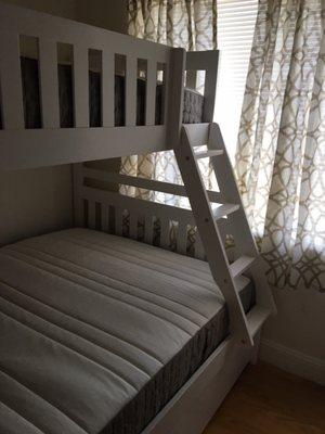 White bunk bed (full & twin) close up