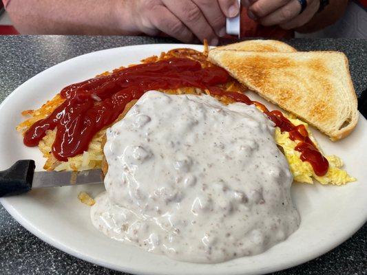 Chicken fried steak and eggs.