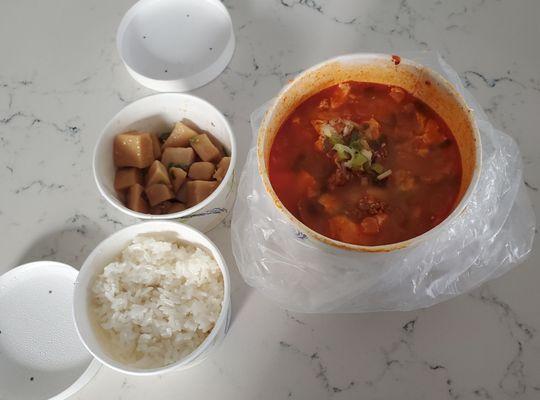 spicy beef tofu stew, served with rice and side dish