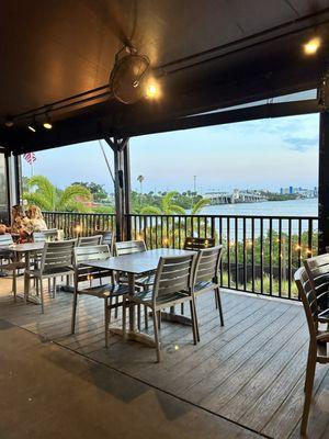 View from the bar looking out toward the water. We miss the old public dock that was here!