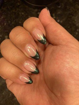 Dip powder base with gel French tip with chrome on top.