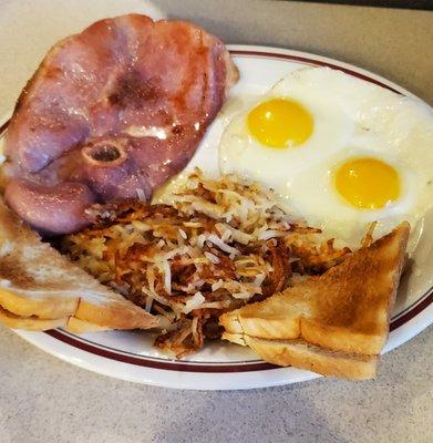 Country Ham 2 Eggs Sunnyside Up hash browns and white toast. Yummy