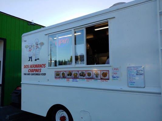 Food truck with menu below the window. Cash only!