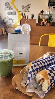 Matcha with oat milk, special and pork banh mis and coffee beans