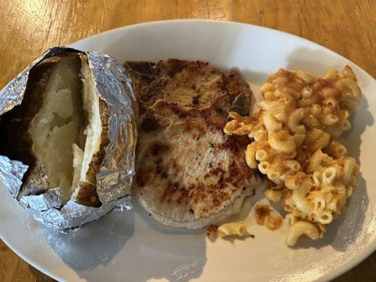 Grilled pork chops, baked potato, Macaroni