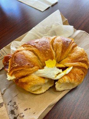 Bacon, egg, and cheese croissant sandwich for dine-in.