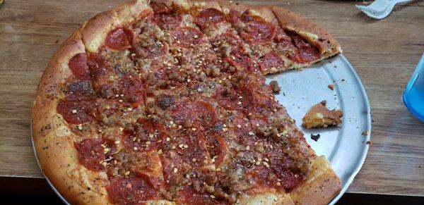 Large Pepperoni & Sausage pizza. Love the way it's cut too.