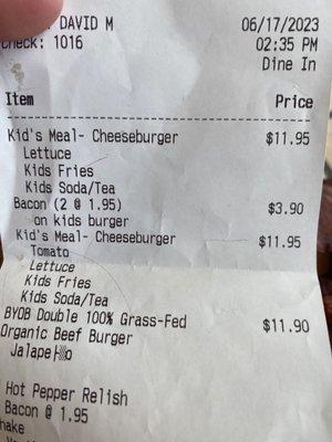 Double charged for bacon on kids burger, the rude cashier says they have to charge $2 per slice of bacon on kids meal ‍