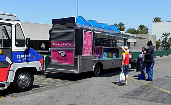 Food trucks parked behind the convention center