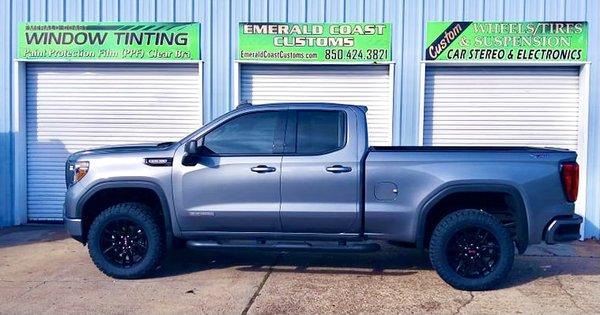 New Chevy Truck w/ 20% SUNTEK Ceramic Window Tint, 5% Visor Strip & 34" NITTO Ridge Grappler Tires