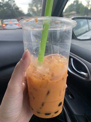 Large Thai tea with boba and extra ice instead of easy