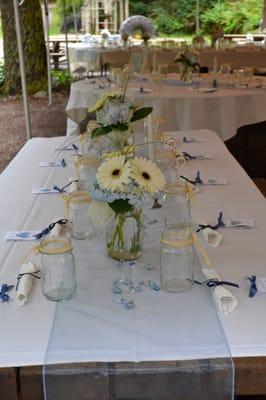 Table flowers for the reception at a wedding we attended.