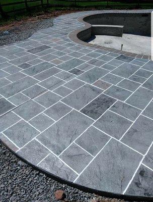 stamped concrete pool deck installed by metric concrete